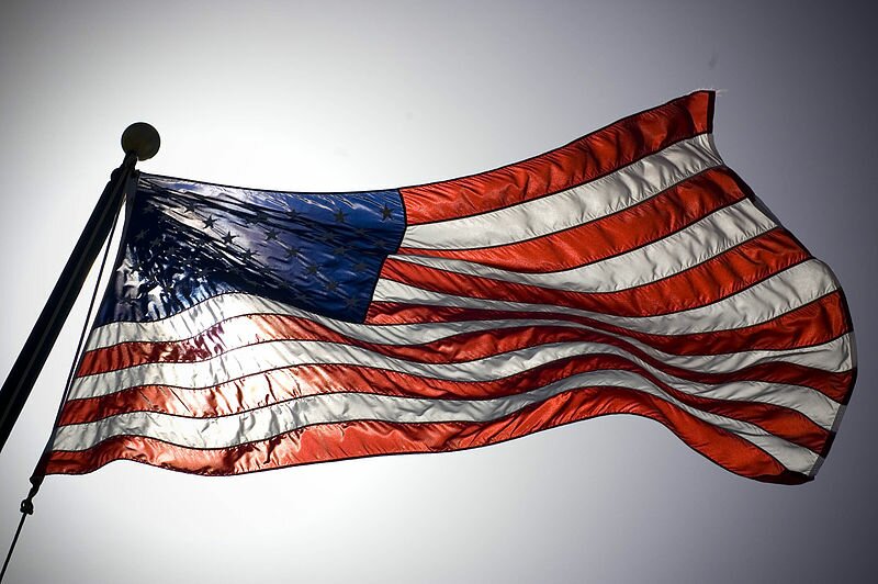 800px-US_Navy_060417-N-8157C-162_The_American_flag_flies_prominently_during_the_World_Patriot_Tour_performance_at_Hickam_Air_Force_Base